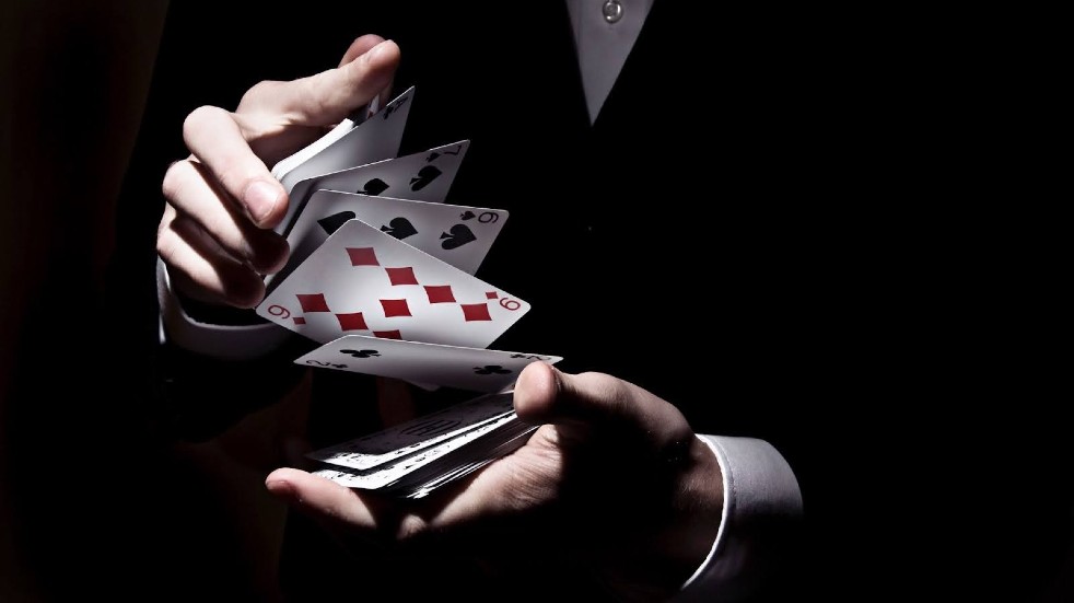 Magician shuffling cards